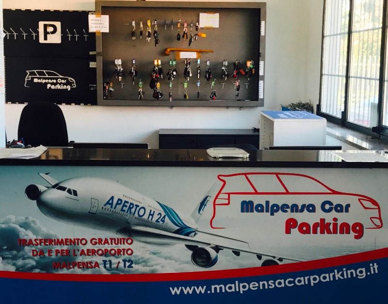 AnyConv.com malpensa car parking 07